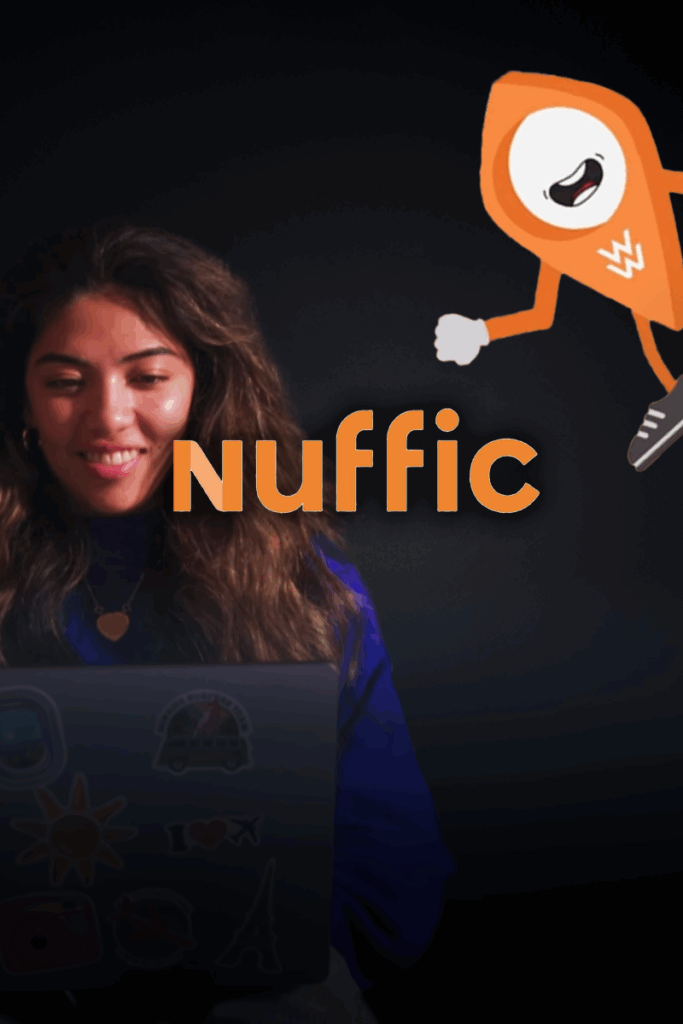 Young woman working on a laptop alongside a friendly animated character, representing an educational digital project.